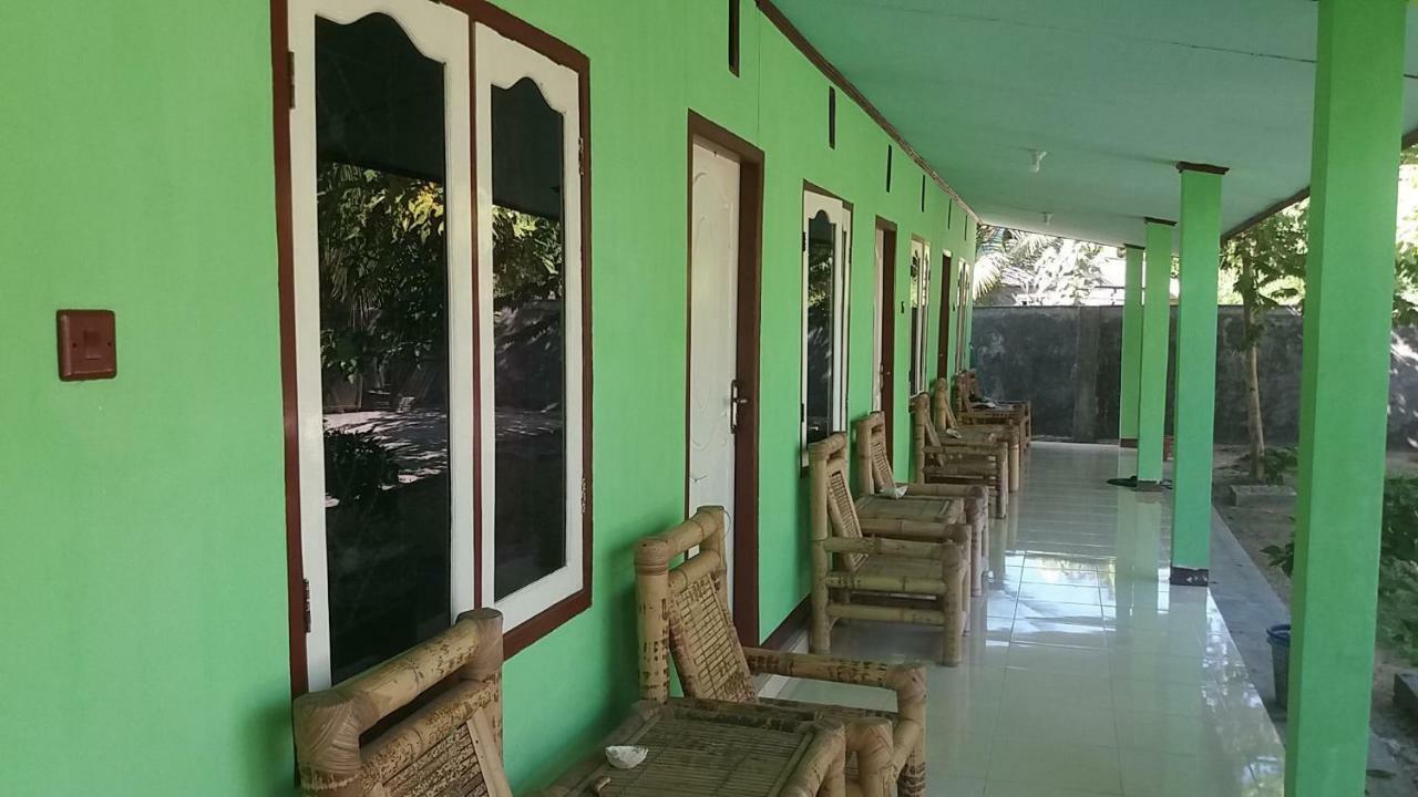Ekas Beach Guesthouse Mitra Reddoorz エクステリア 写真